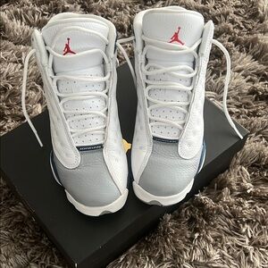 Kids Jordan White and Blue Sneakers